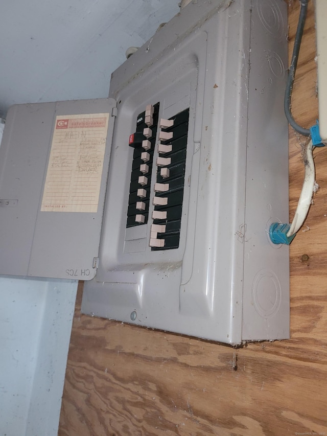 utility room featuring electric panel