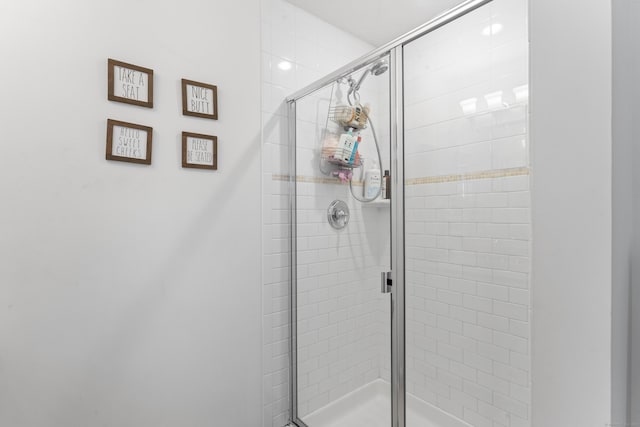 bathroom with a stall shower