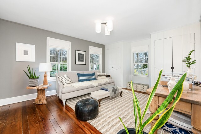 interior space with dark wood-style floors and baseboards