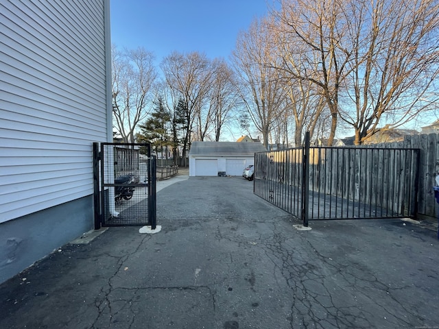 exterior space with an outbuilding and fence