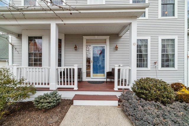 doorway to property featuring a porch