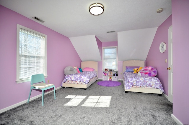 bedroom with carpet, visible vents, and baseboards