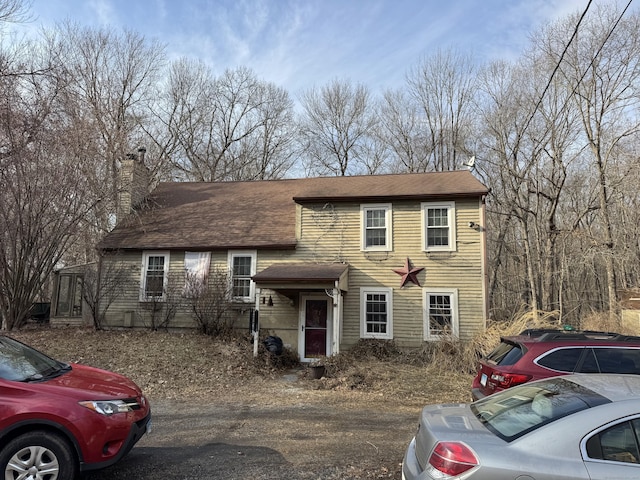 view of front of house with a chimney