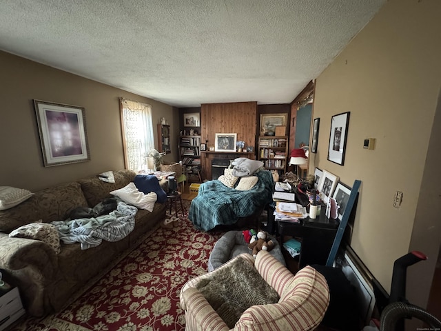 living room with a textured ceiling