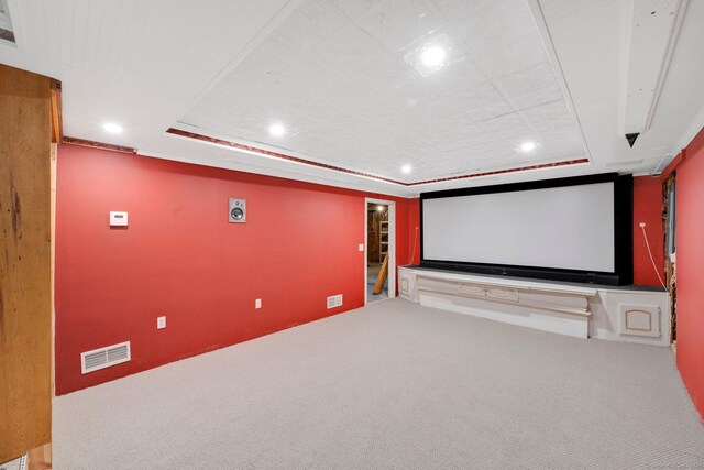 carpeted home theater with recessed lighting and visible vents