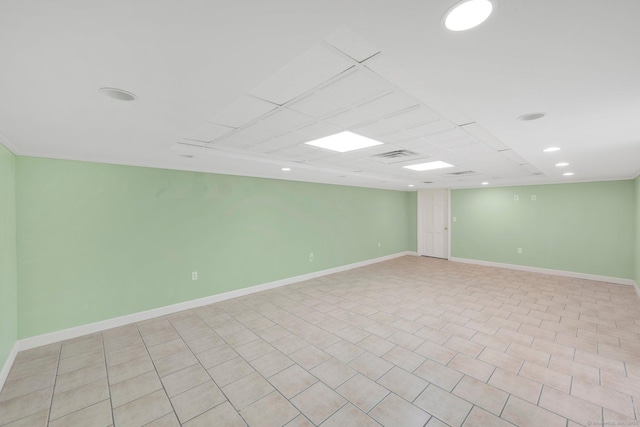 empty room featuring recessed lighting, visible vents, and baseboards