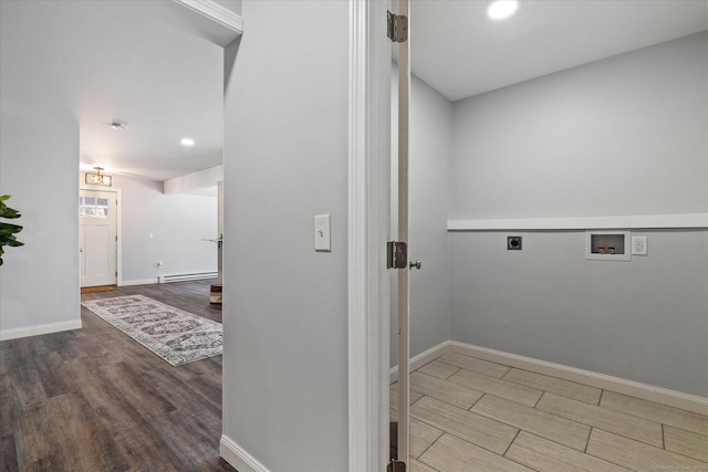 laundry room with washer hookup, baseboard heating, wood finished floors, and electric dryer hookup