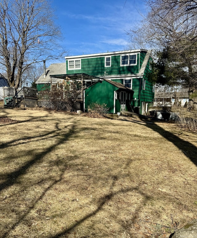 rear view of house with a deck