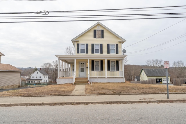 view of front of property featuring covered porch