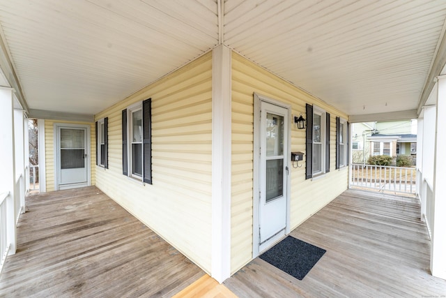 wooden deck featuring covered porch