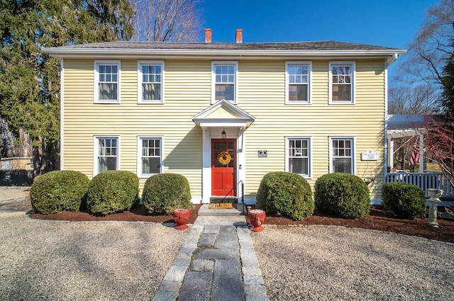 colonial home with a chimney