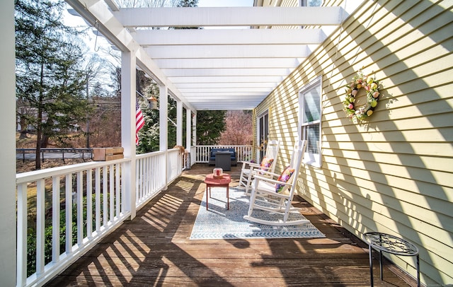 wooden terrace featuring a pergola