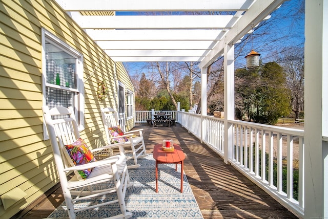 wooden deck with a pergola