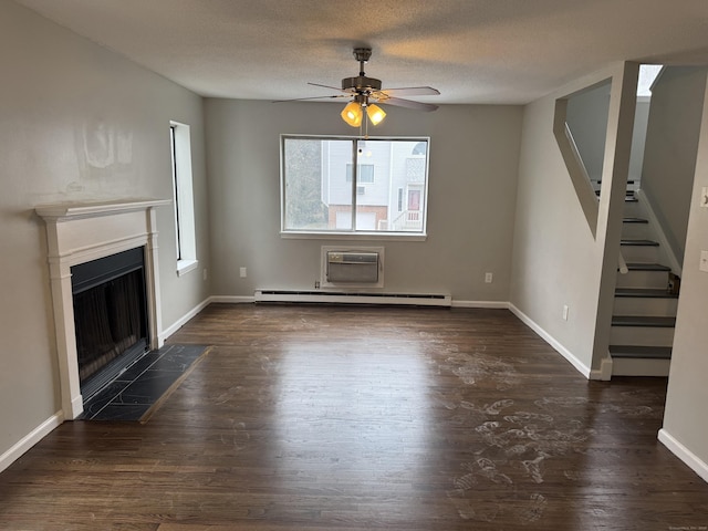 unfurnished living room with a fireplace with flush hearth, stairway, baseboard heating, and dark wood finished floors