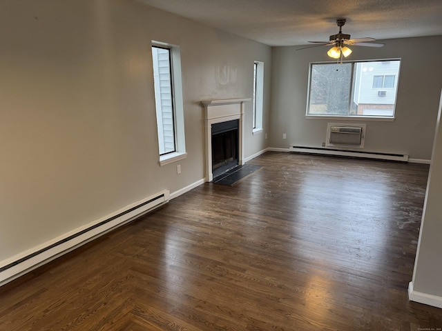 unfurnished living room featuring a fireplace, baseboards, and baseboard heating