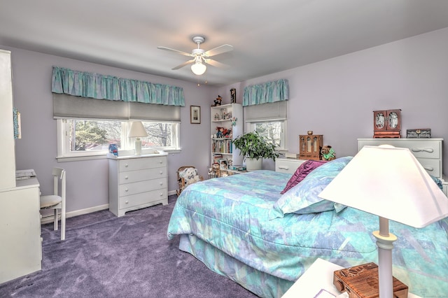 carpeted bedroom featuring a ceiling fan and baseboards