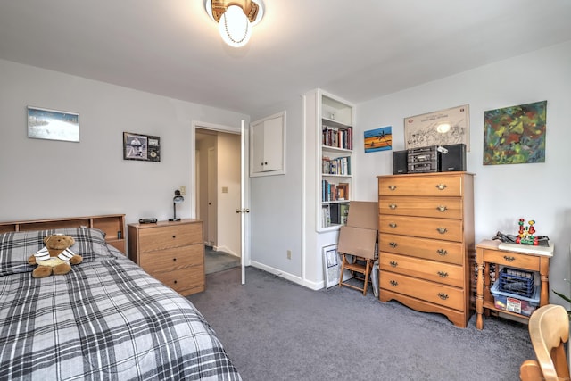 bedroom featuring baseboards and carpet floors