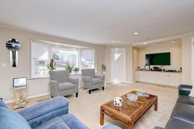 living area featuring light carpet, recessed lighting, baseboards, and ornamental molding