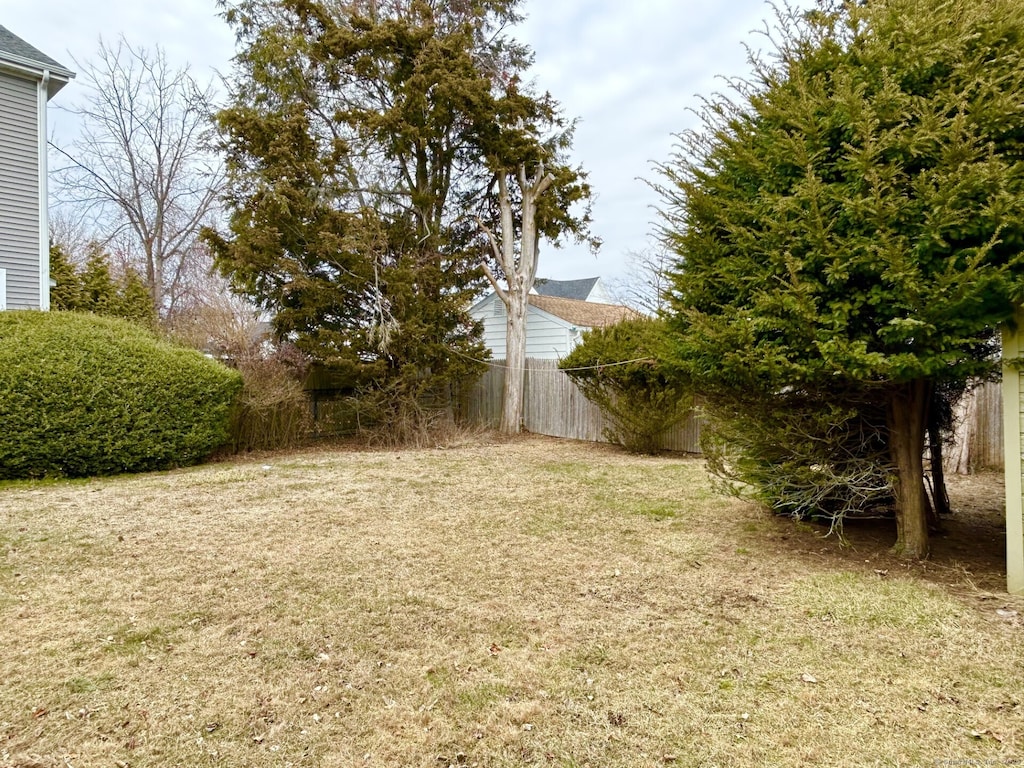 view of yard featuring fence