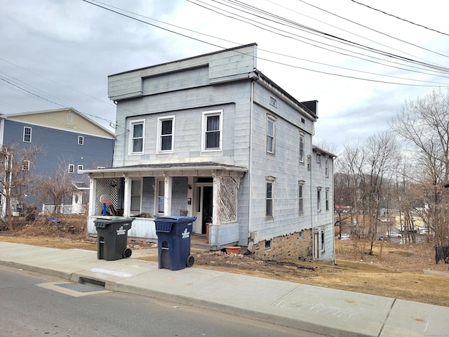 view of front of home featuring covered porch