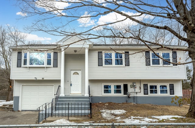 bi-level home with an attached garage