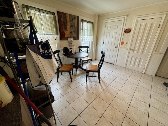 dining room with light tile patterned flooring