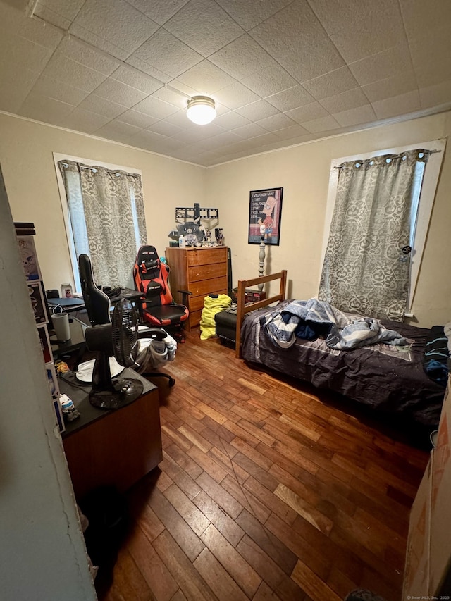 bedroom with wood finished floors