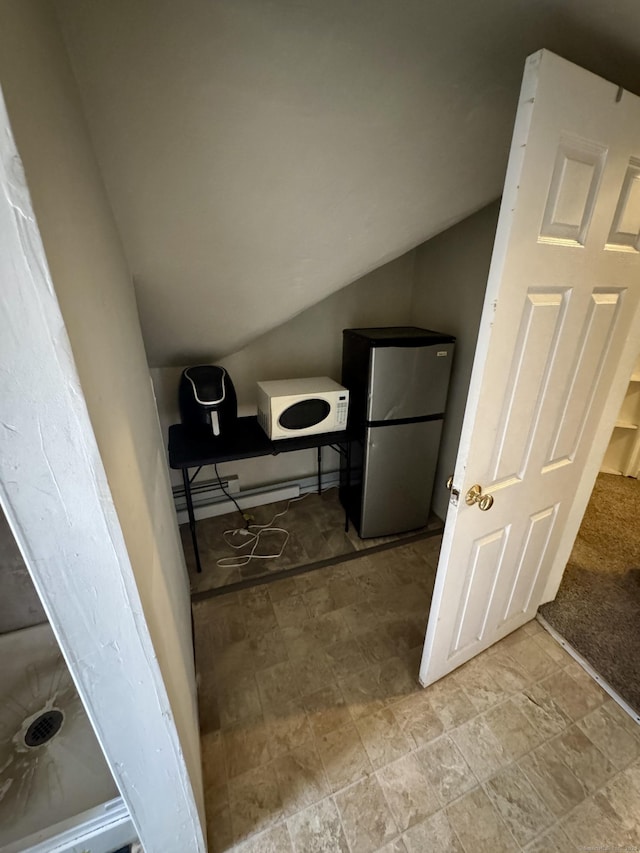 bathroom with vaulted ceiling