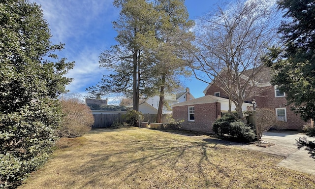 view of yard with fence