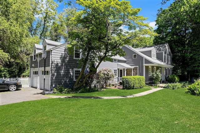 64 Old Kings Hwy S, Darien, CT 06820 - view of front facade featuring asphalt driveway and an attached garage