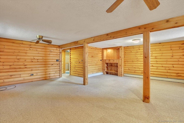 interior space with a textured ceiling and ceiling fan