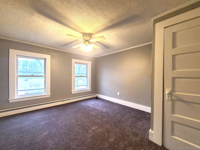 carpeted spare room with a baseboard heating unit, ornamental molding, a ceiling fan, a textured ceiling, and baseboards