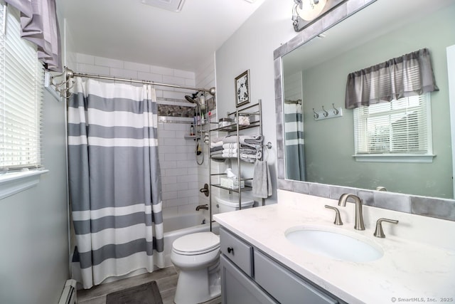 bathroom featuring toilet, a baseboard radiator, wood finished floors, shower / tub combo with curtain, and vanity