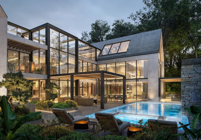 457 Field Point Rd, Greenwich, CT 06830 - rear view of property with a pool with connected hot tub, outdoor lounge area, and a patio