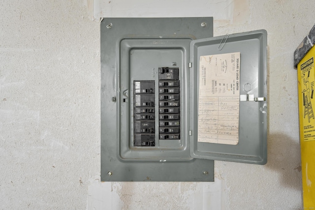 utility room featuring electric panel