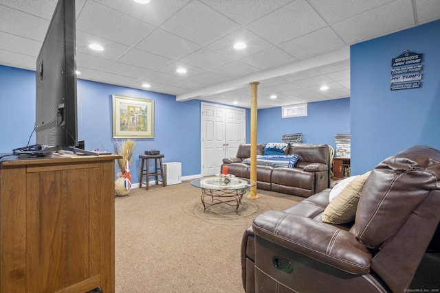 carpeted living room with recessed lighting and baseboards