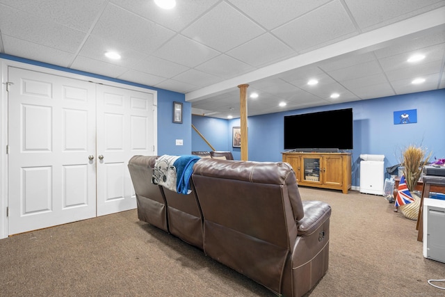 living area with carpet, a paneled ceiling, and recessed lighting