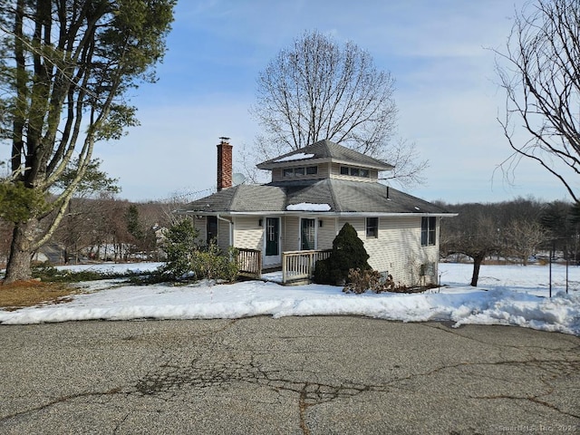 view of front of property with a chimney