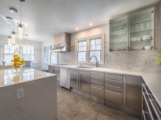 157 N Ave, Westport, CT 06880 - kitchen featuring tasteful backsplash, wall chimney range hood, dishwasher, a wealth of natural light, and a sink