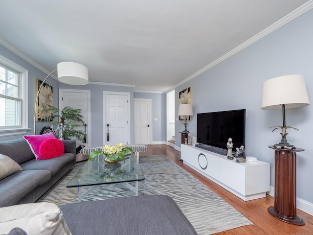 157 N Ave, Westport, CT 06880 - living area with crown molding, wood finished floors, and baseboards