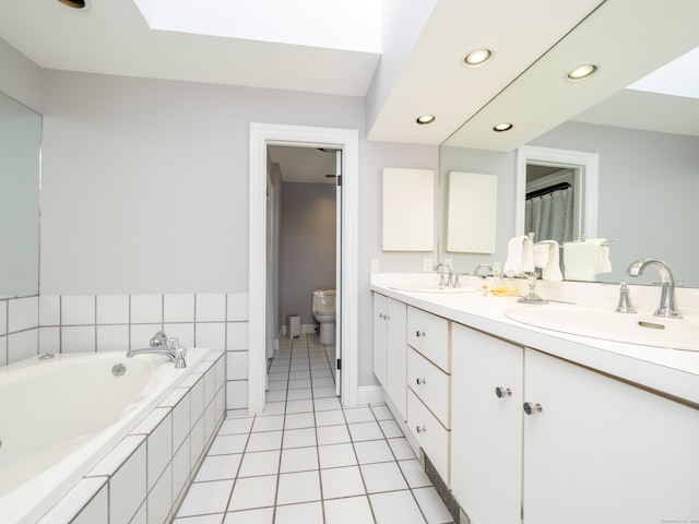 157 N Ave, Westport, CT 06880 - bathroom with a sink, toilet, a bath, and tile patterned flooring