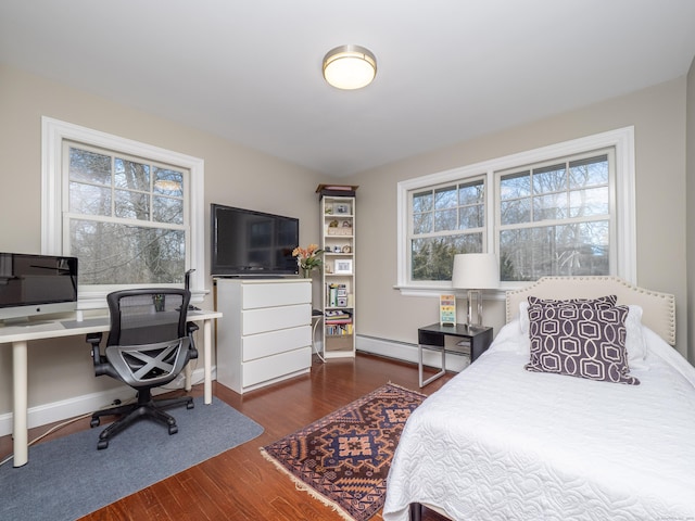 157 N Ave, Westport, CT 06880 - bedroom featuring dark wood-style floors, baseboards, and baseboard heating