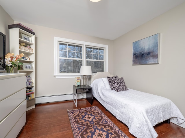 157 N Ave, Westport, CT 06880 - bedroom featuring wood finished floors and a baseboard radiator