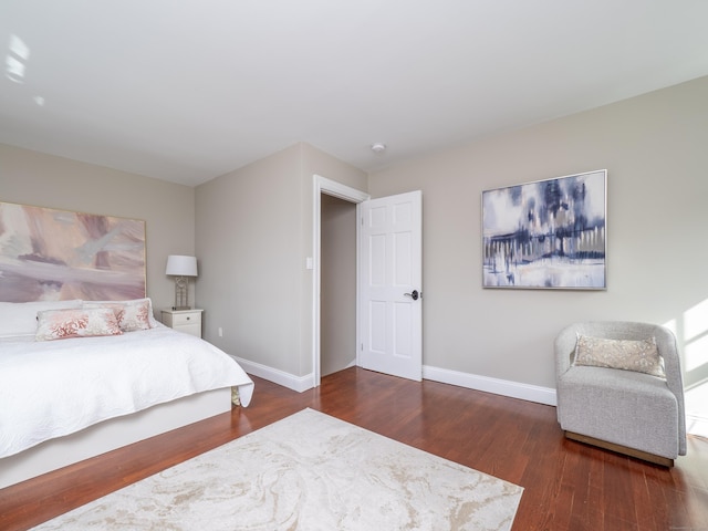157 N Ave, Westport, CT 06880 - bedroom with baseboards and wood finished floors