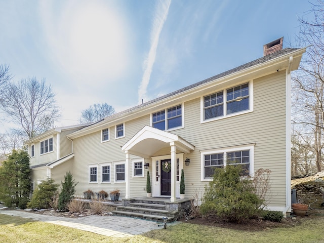 colonial home with a chimney