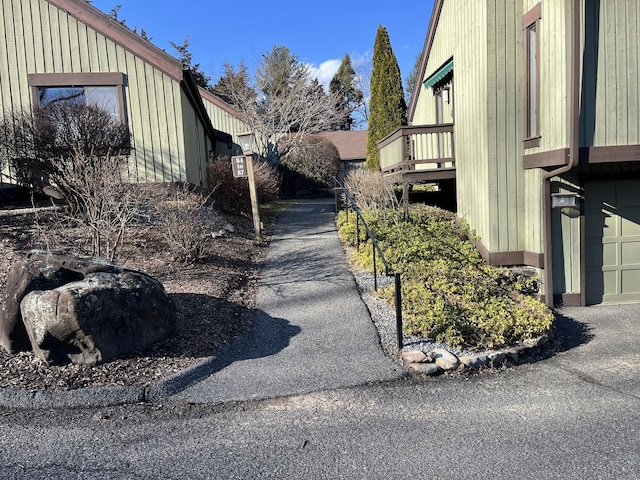 view of side of home with a garage