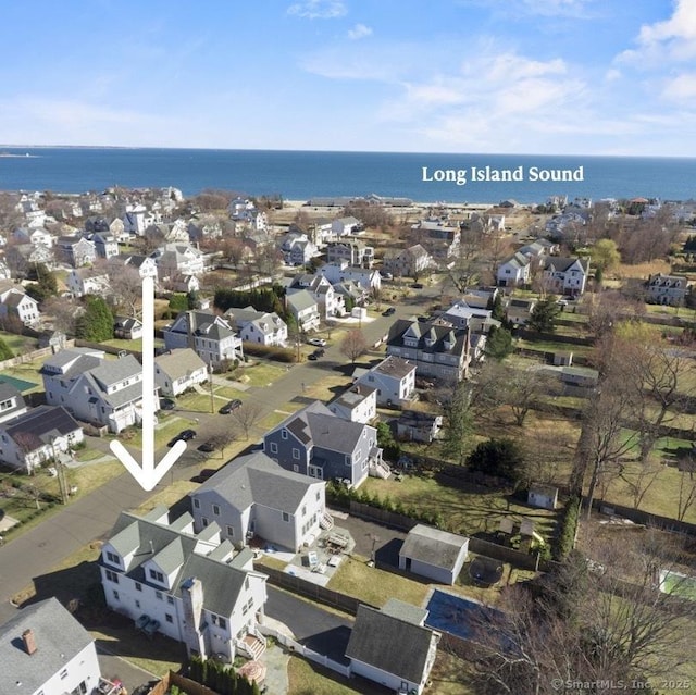 aerial view with a water view and a residential view