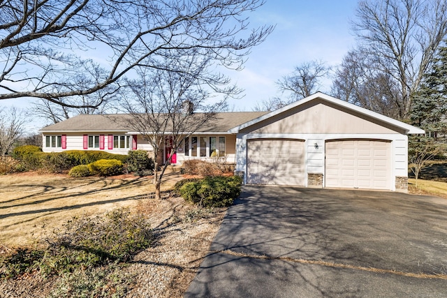 ranch-style house with an attached garage, stone siding, driveway, and a chimney