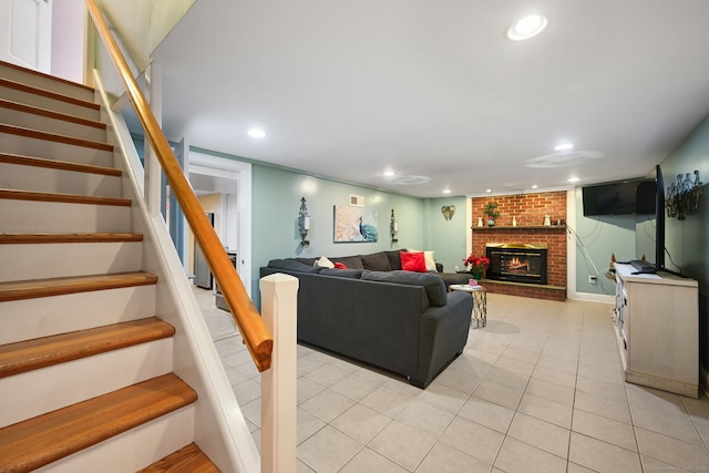 living area with stairs, light tile patterned flooring, a fireplace, and recessed lighting