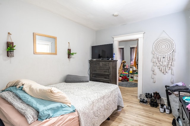 bedroom featuring light wood-style floors